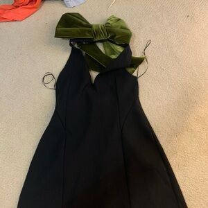 Elegant Black Dress with Green Velvet Bow
